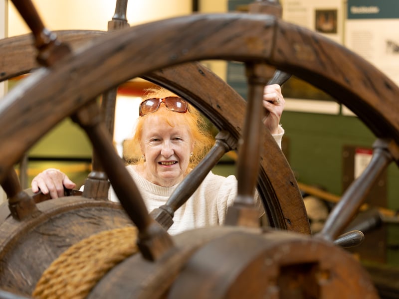 The Unicorn Preservation Society, the charity responsible for Scotland's oldest ship, is calling for urgent financial support
to secure the future of its Wavemakers volunteer programme. Pictured is volunteer and resident author Margaret Bowman.