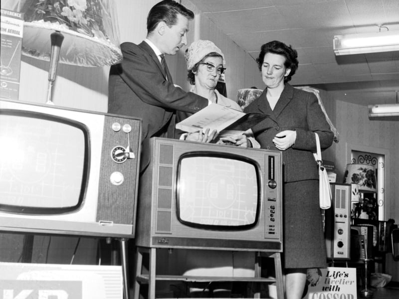 An Evening news & Dispatch 'Find the Ball' competition winner uses her 'Shopping Spree' prize to buy a television set at Telectra House in Great Junction Street, Leith, in June 1966.