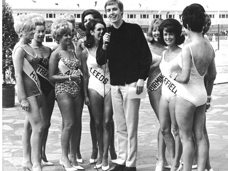TV and radio personality Simon Dee with beauty queens from around the country in the 1960s