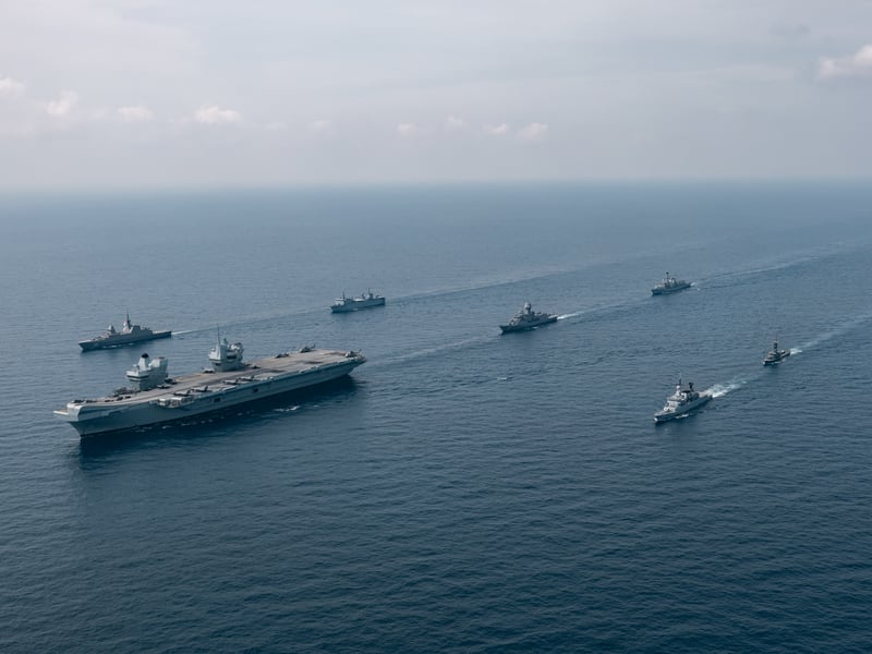 Pictured: HMS Prince of Wales (centre), Royal Australian Navy Anzac Class frigate HMAS Ballarat (centre middle), UK's HMS Richmond (centre background), Royal Malaysian Navy ship KD Lekir (right), Republic of Singapore Navy Victory class Missile Corvette (right background), Republic of Singapore Navy RSS Formidable (left) and Royal Malaysian Navy KD Sri Indera Sakti (left background). 