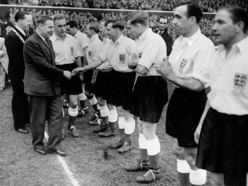 Mr Hector McNeil, Secretary of State for Scotland, shaking hands with members of the England team prior to a clash with Scotland in 1950.