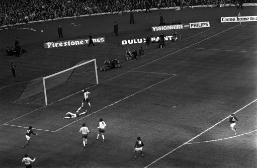 Joe Jordan (9) scores the opener for Scotland against England in the international match at Hampden.