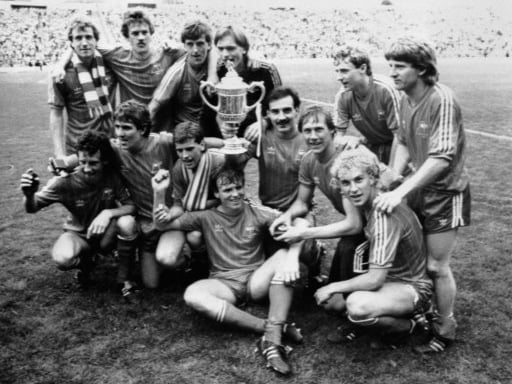 The victorious Aberdeen team celebrate after they retain the Scottish Cup by beating Celtic 2-1 at Hampden.