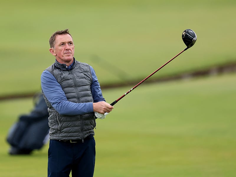 Champion jockey Sir AP McCoy tees off the second at the Old Course.