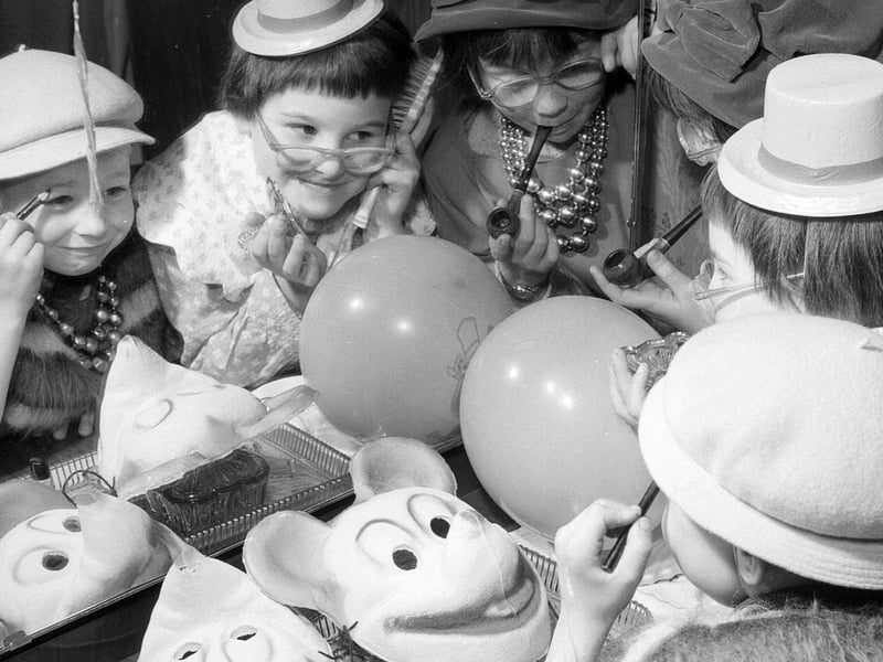 Dressing up, wearing masks, decorating balloons and eating lots of sweets was an essential part of the Halloween experience.