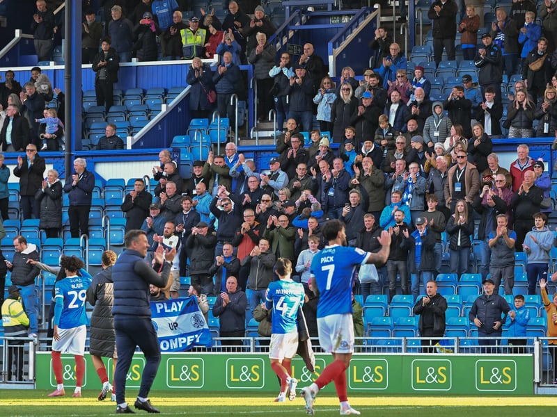 Pompey fans congratulate the players at the final whistle