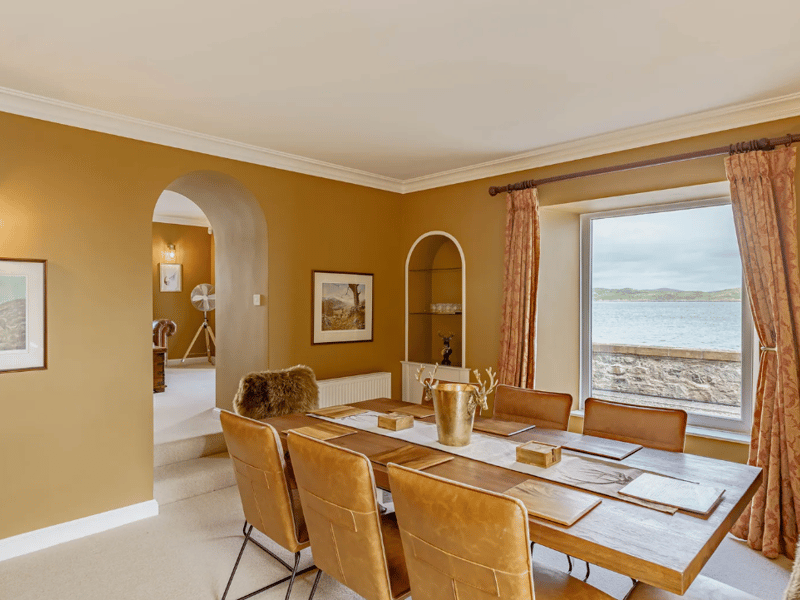 The dining room is perfectly set for feasts with family and friends.