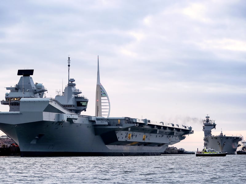 HMS Ocean sailing into Portsmouth Naval Base for the last time before she was decommissioned from the Royal Navy.