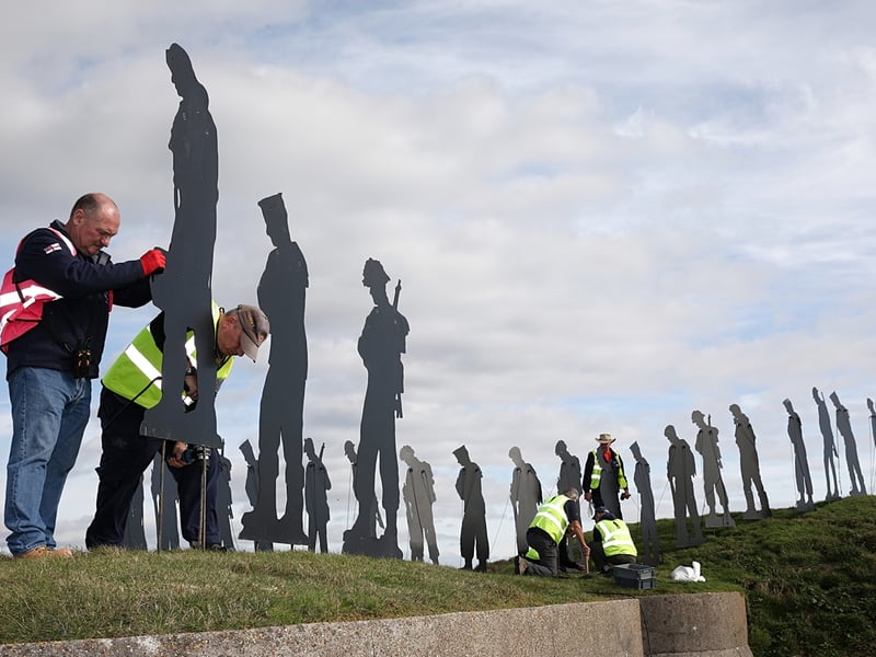 Volunteers installing the tribute