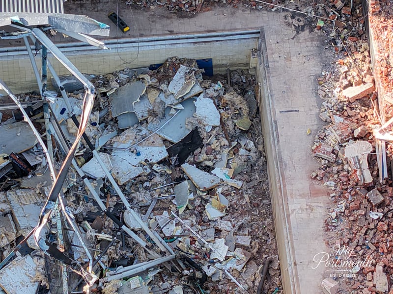 Debris from the roof is inside the swimming pool