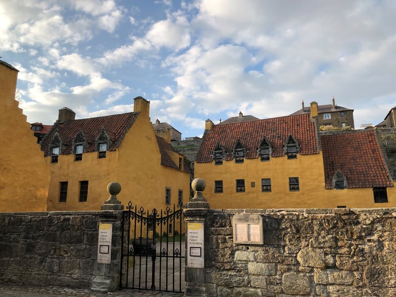 Culross Palace, Garden and Royal Burgh feature in a number of scenes across multiple seasons in Outlander. Culross Palace’s Withdrawing Room doubles as Geillis Duncan’s parlour, where Jamie comes to meet Claire after her visit to Geillis. In Season 2, both the exterior and interior of Culross Palace feature as a tavern on the road to battle. In 2014, there were 10,669 visitors to the palace in 2014 and then 25,841 visitors in 2024.
