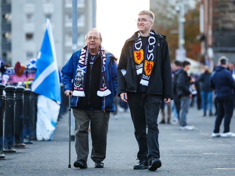 Family member make their way to Hampden Park for the game against Greece.