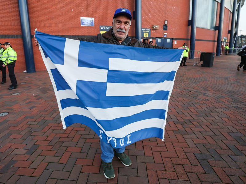 A Greece fan before the game at Hampden.