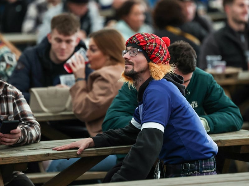 Scotland fans in the Saltire Square fan zone before the game at Hampden.