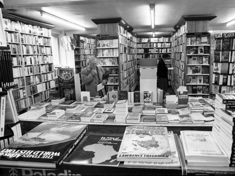 A man browsing the books at James Thin bookshop in South Bridge, Edinburgh, in April 1988