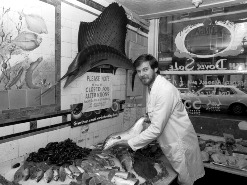 Fishmonger Peter MacIntyre with a display of fish and seafood in his shop, Longa fish (formerly Miller's Fish Shop) at Tollcross, Edinburgh, in March 1986