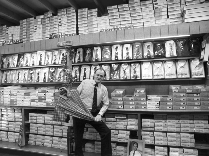 Owner Alex Hatton with a selection of men's shirts at William Meek's, on South Clerk Street, Edinburgh, in April 1989