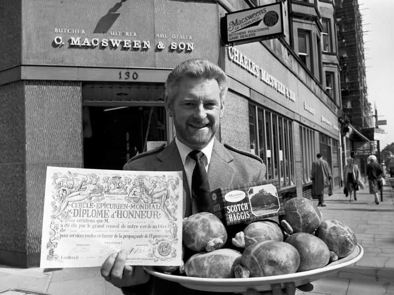 John MacSween outside Charles MacSween & Son's butchers shop on Bruntsfield Place, Edinburgh, in July 1987. He is holding an award from the Cercle Epicurien Mondiale for the firm's haggis.