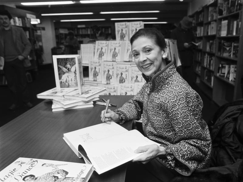 Ballet dancer Dame Margot Fonteyn signs copies of her book, Magic of the Dance, at John Smith's bookshop in Glasgow, in January 1980