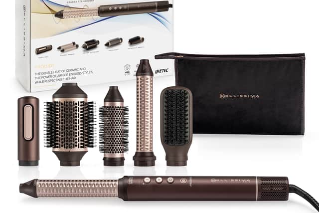 It comes with a selection of attachments, and a plush bag