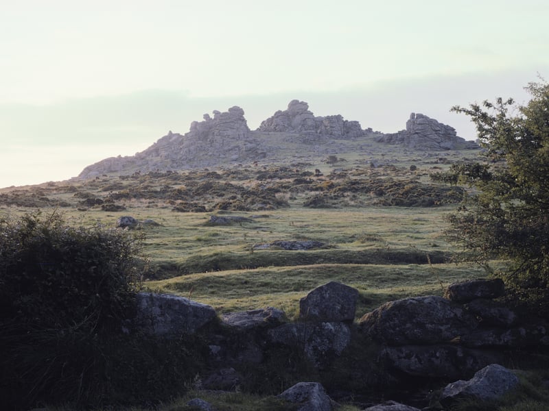 A rocky outcrop on Dartmoor with a long history of paranormal sightings. Visitors have reported a range of strange experiences, including seeing spectral figures and hearing disembodied whispers, with some believing the area is haunted by an ancient village that once stood nearby. 👻 7.54/10