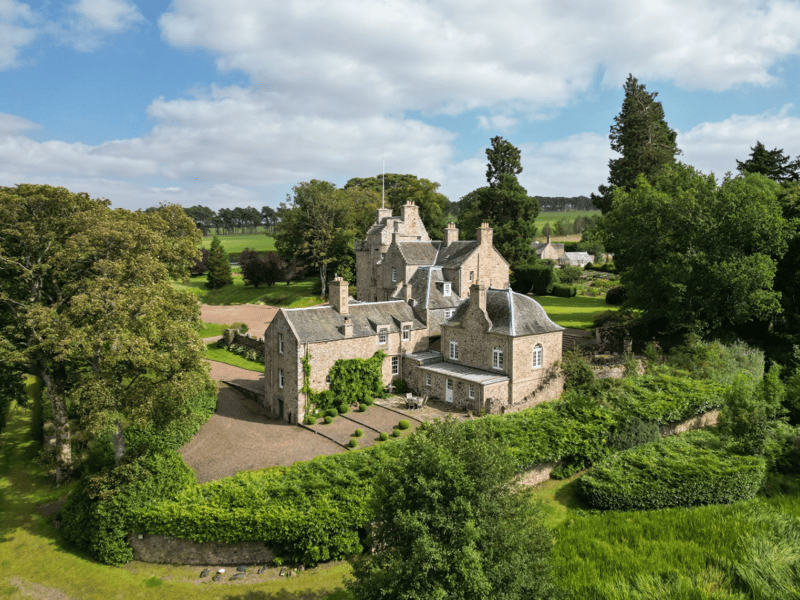 Cakemuir Castle is located in the peaceful countryside of Midlothian. Dating back to the 16th century, this Category B listed castle once offered refuge to Mary Queen of Scots in 1567, as she fled Borthwick Castle disguised as a pageboy. Today, a stone plaque at the base of the tower’s original spiral staircase commemorates her stay, bearing the initials ‘MR’ and the date 11th June 1567. It is on the market with Rettie for offers over £2.9 million.