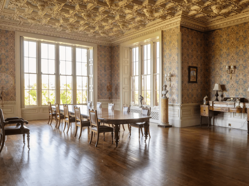 The entrance opens into the main hall with its adjacent inner hall. Beyond the formal reception rooms lies the private chapel, with its kitchenette and small dining room. The first floor contains twelve bedrooms and six bathrooms. There are four additional bedrooms with two bathrooms on the second floor. On the lower ground floor and basement levels, including the derelict former servants’ hall, storerooms, and additional domestic quarters. There is also a range of cottages, gate lodges and stable flats located on the estate.