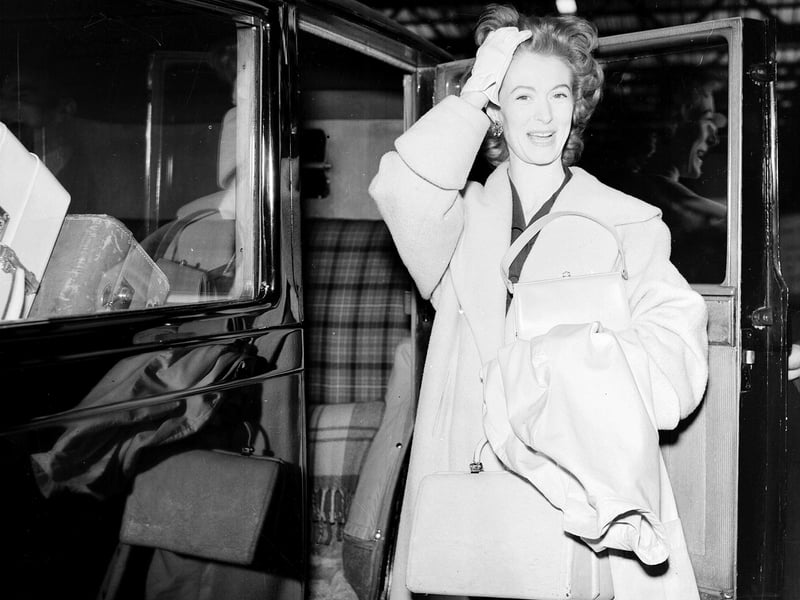 Dancer and actress Moira Shearer arrives at Waverley Station in Edinburgh to star in 'Man of Distinction' at  the Edinburgh Festival 1957.