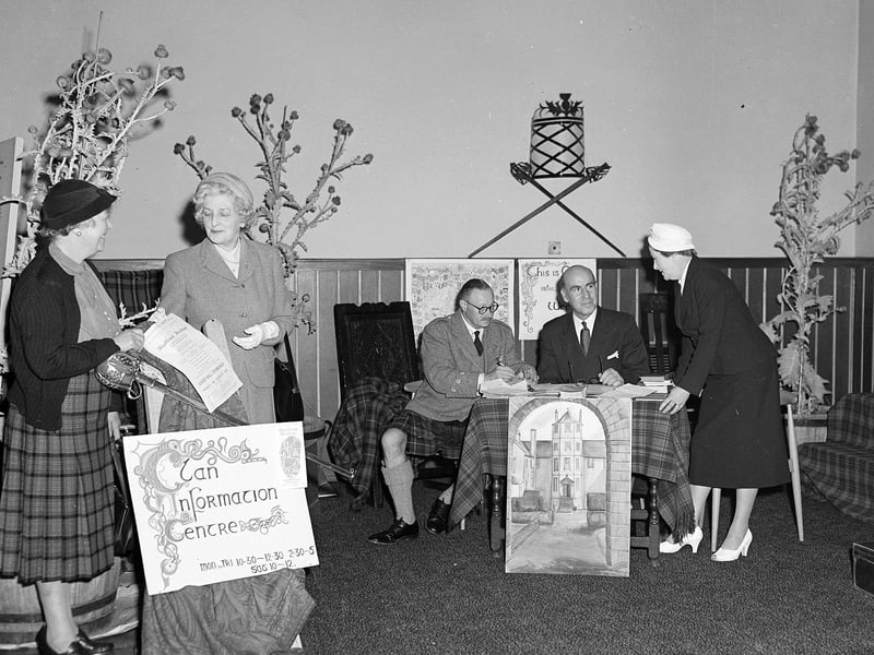 The Scottish Tourist Board's new 'Clan Information Centre' in 1957 - with Mr R Robertson and Mr J Cameron dealing with enquiries.