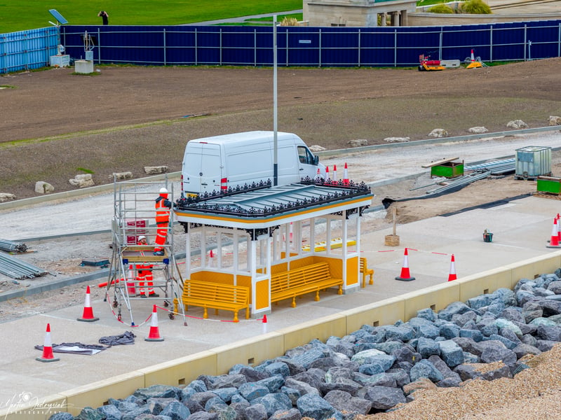 Iconic yellow shelters are placed into position on the new-look promenade in Southsea