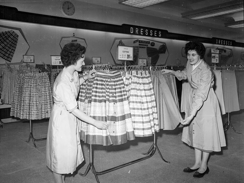 Marks and Spencers opened a new store in Princes Street Edinburgh, in June 1957. Female employees are pictures in the ladies fashion department beside the skirts.