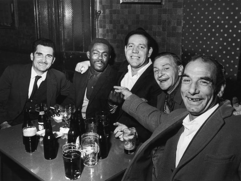 A Jamaican carpenter and a group of Irish labourers drinking in the pub in 1965