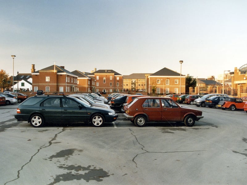 St Davids Court just off David Street to the left. The White building to the left of the photograph is David Street cafe at number 43 David Street. Pictured in November 1999.