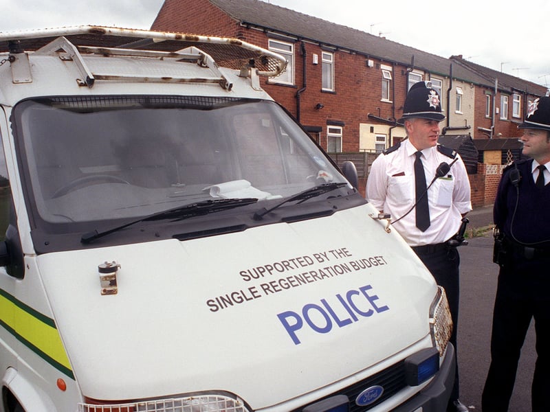 PC Martyn Sparling and Sgt Paul Brownbill, right, by a sponsored police van at Holbeck Division. Pictured in Juky 1999.
