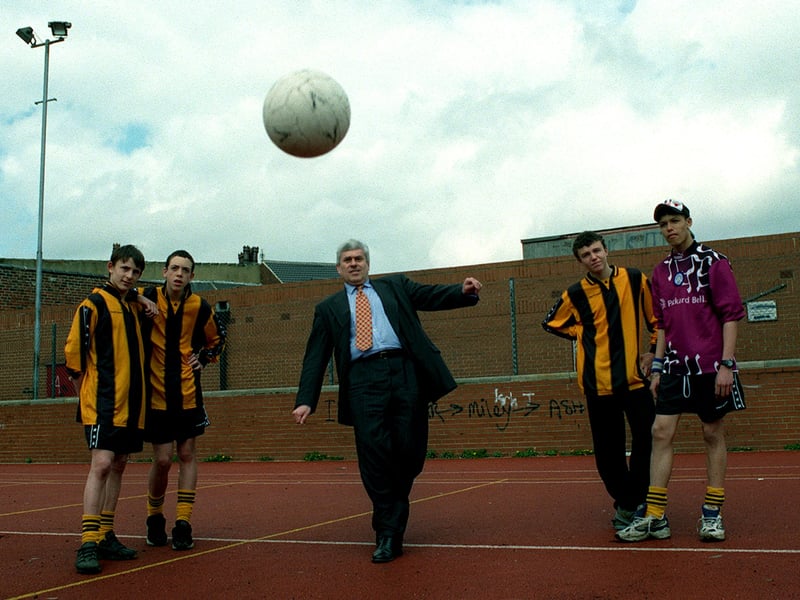 Leeds United chairman Peter Ridsdale tests his footballing skills after presenting a cheque for £7,000 to Holbeck Youth Club in April 1998. He is watched by four members of the Holbeck Hornets football teams - Gareth Robinson, Robert Kitchingman, Matthew Allotey and Benjy Baker.