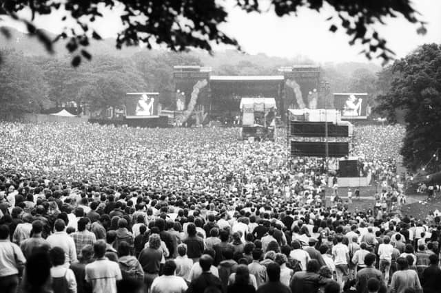 A huge crowd turns out to watch Genesis play at Leeds' Roundhay Park in July 1987