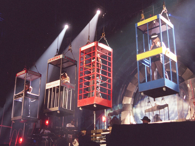 All Saints are lowered onto the stage at Sheffield Arena during a concert in June 1999