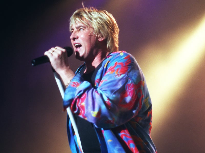 Def Leppard frontman Joe Elliott on stage at Sheffield Arena in October 1999