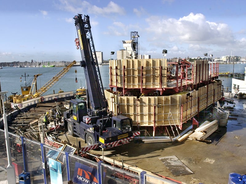Steel fabrications being brought in by barge and crane, as the Spinnaker tower starts to rise from its foundations at Gunwharf Quays, Old Portsmouth.

Picture: Michael Scaddan