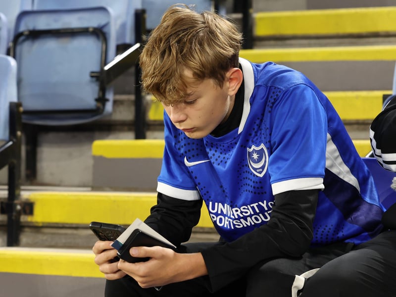 This young fan must be checking the earlier Championship scores