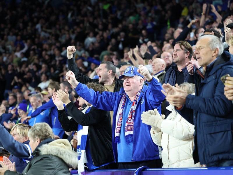The travelling Pompey fans celebrate John Swift's 58th-minute goal