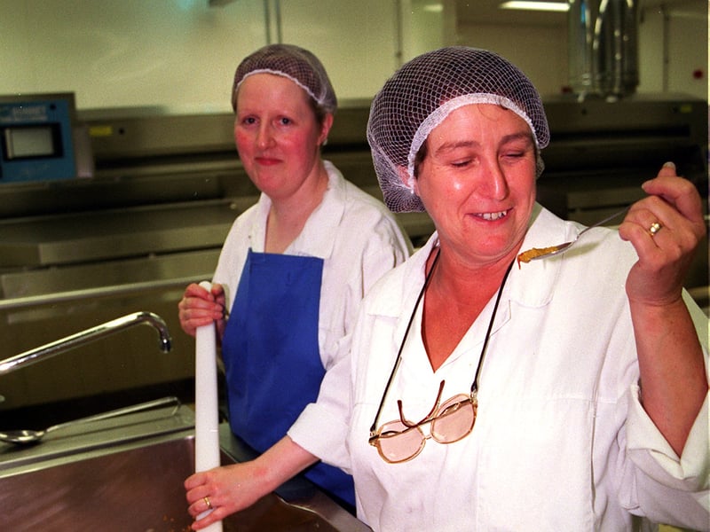Production manager Rita Scholefield samples some lentil curry while Elaine Dawson looks on, at the Northern General Hospital, Sheffield, in July 1997