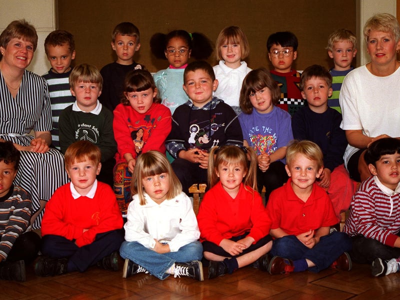 Mrs Gosling and Mrs Milton with their first-year class at Lydgate Infant School, Sheffield, in 1997