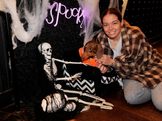 Tamara Craven with Milo on the spooky sofa.