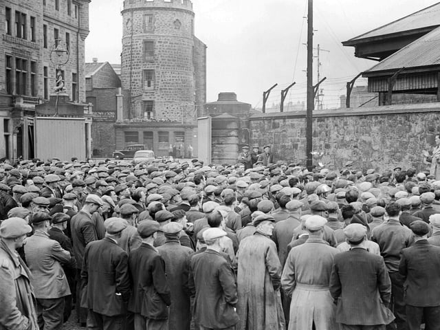 Striking workers at Leith Docks gates in June 1956.
