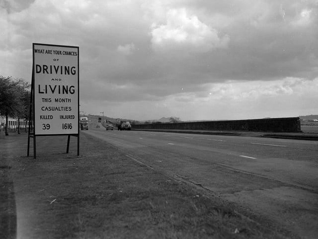 A new road safety sign alongside the main Edinburgh to Glasgow road.