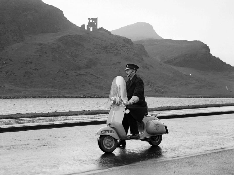 Park-keepers in the Queen's Park were issued with scooters in 1956, Thomas Wilson is pictured patroling on his scooter next to St Margaret's Loch with St Anthony's chapel in the background.