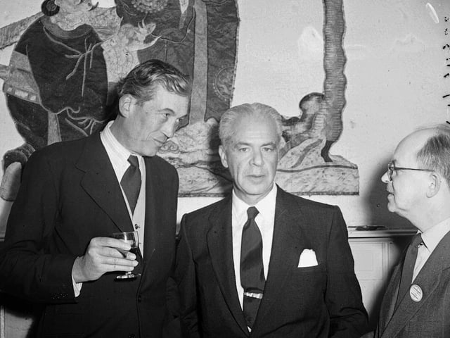 American film director John Huston with producer Walter Wanger at the 1954 Edinburgh Film Festival.