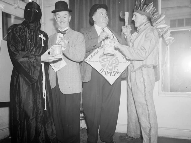 Stan Laurel and Oliver Hardy taking part in Edinburgh University students charity week in 1954.