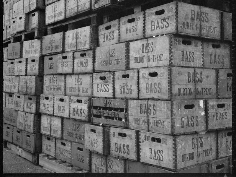 Crates of Bass beer piled high at the brewery in Burton upon Trent, Staffordshire, in the mid-1960s. The original Bass Brewery was founded in 1777, and by 1877 it had become the world's largest brewery, producing one million barrels a year. Bass Pale Ale was at one time the highest-selling beer in the UK. Brewing ceased at the original Bass brewery in 2005, but Bass is still brewed at a different site in Burton, and Molson Coors now makes Carling and other beers at a modern brewery beside the original one.